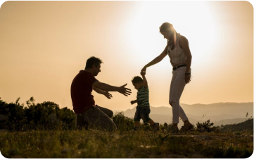 Family silhouette at sunset